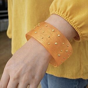 Vintage carved orange lucite gold tone studded accents bangle bracelet women